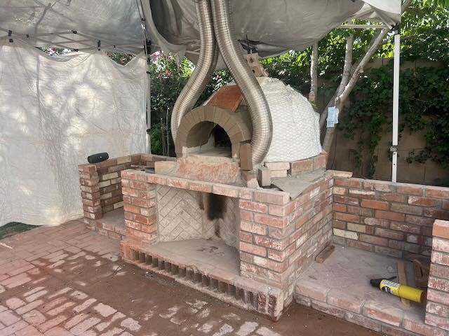 Click image for larger version

Name:	Cladding and SS chimney.jpg
Views:	0
Size:	91.0 KB
ID:	468083