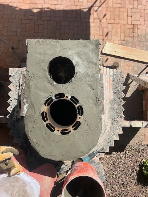 Click image for larger version

Name:	Top of chimney  Both Flues.jpg
Views:	0
Size:	93.2 KB
ID:	468105