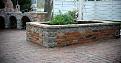 The herb garden to the east of the oven had to be rebuilt after the oven was finished, the oven really made the old one built of stacked limestone look really shabby! This one is solid and the top is at a great height for seating.