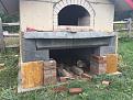 Need to finish the brick arch before cutting the remainder of the travertine base on the front.