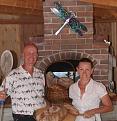 Mike & Susan at the oven with a bread batch (8/2010)