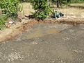 Corner where oven will be built was excavated deeper to accommodate thicker layer of concrete & extra rebar.