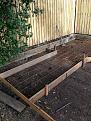 2m x 1m foundation slab for side bench set off the sleepers by 500mm for a garden bed.