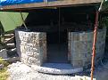 About one meter high now. Cant do any more until the Pizza oven is completed. Then I can build it in.