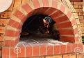 Full arch with flared opening - brick design