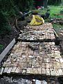 Foundation is next to trees in a woodland. Roots could destabilise any foundations. So I created a piling upon which a reinforced slab is casted to avoid any cracks to the foundation.