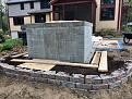 Retaining wall for the slope behind the oven