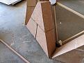 The triangles are cut from 3 bricks and then mortared together.